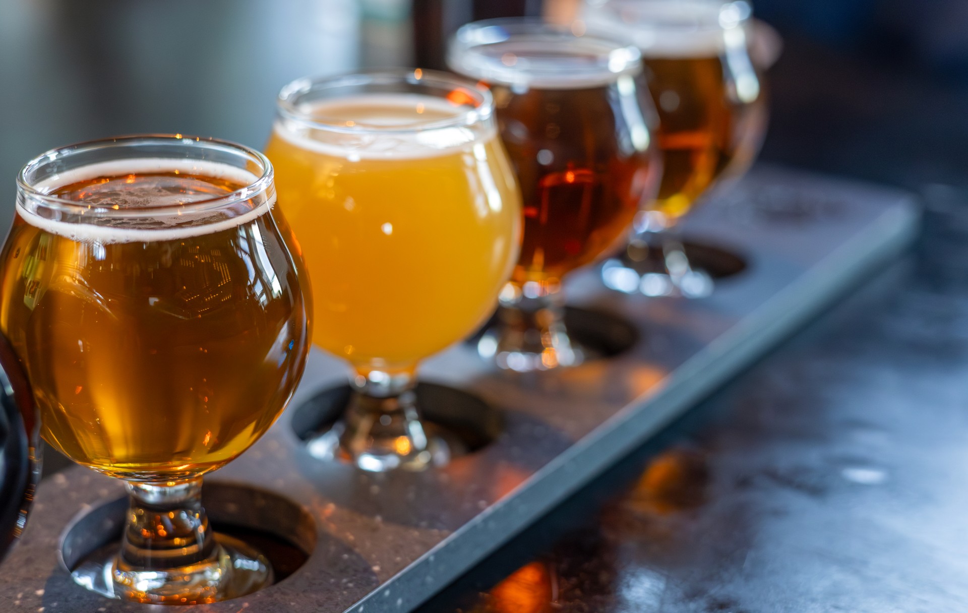 Craft beers served together in a sampler tray